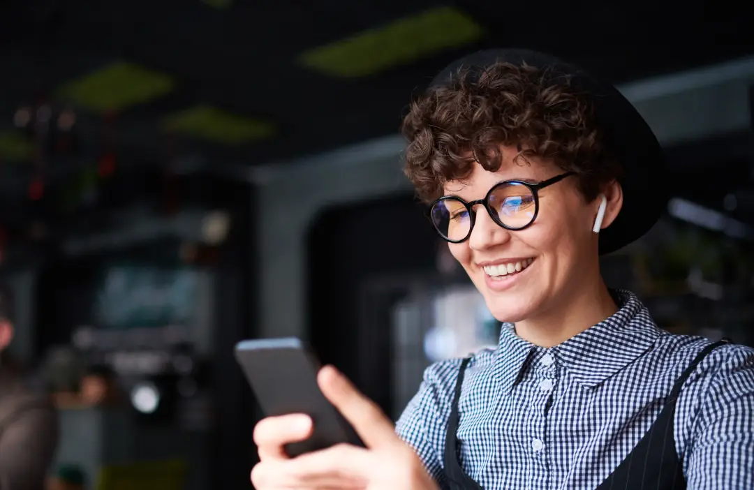 Happy restaurant owner with digital menu services.