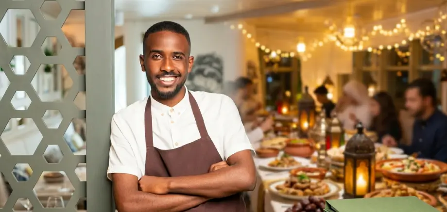 Saudi restaurant waiter is smiling in ramadan season